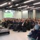 Während der grünen Woche in Berlin: Saal mit Redner und Zuhörern