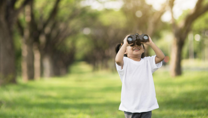 Child with binoculars