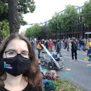 Girl with mask on the street during demonstration